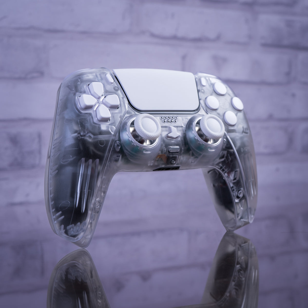 Clear PS5 Gaming Controller With White Buttons GameTraderZero clear-ps5-gaming-controller-with-white-buttons-gametraderzero