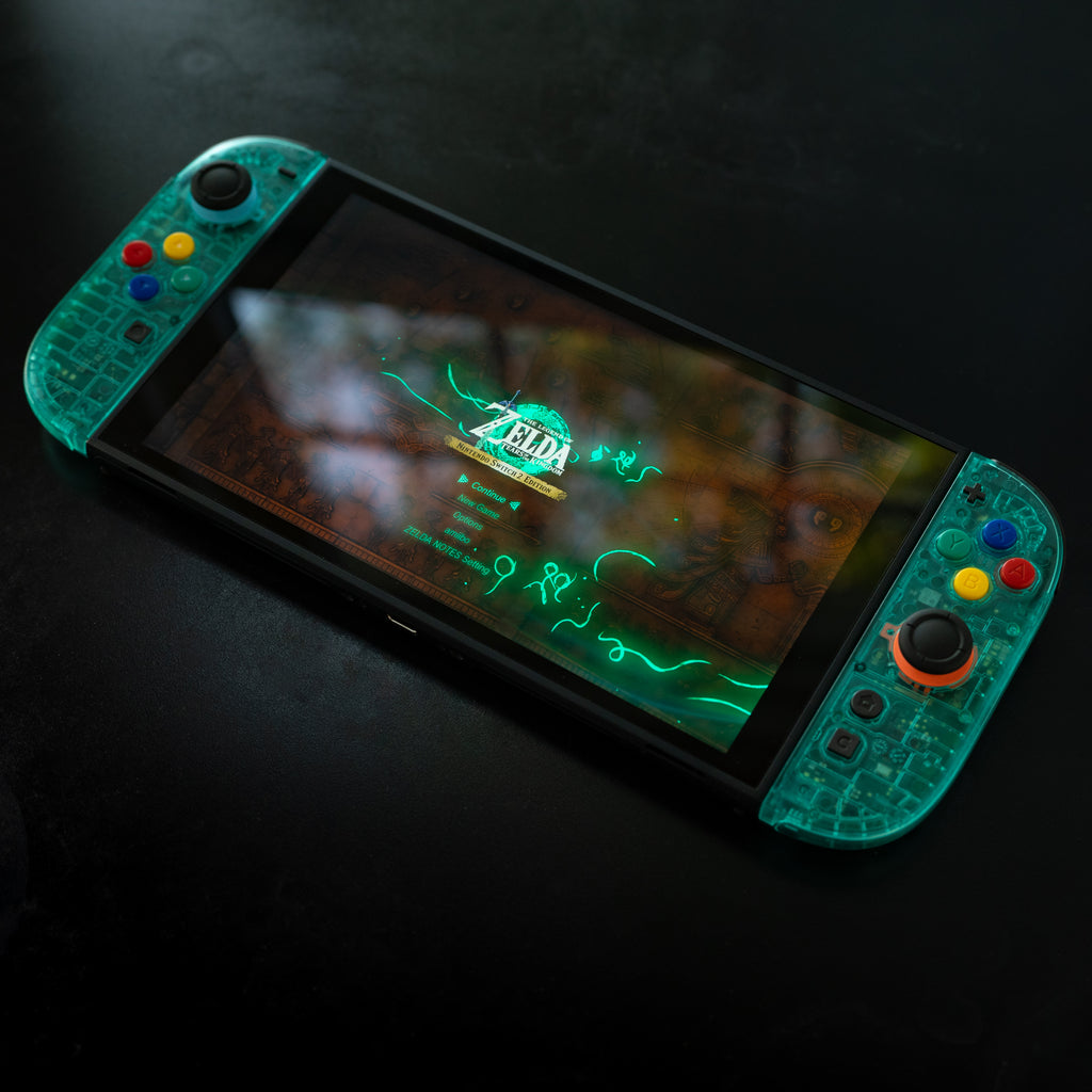 Translucent teal Switch 2 Joy-Cons with SNES buttons