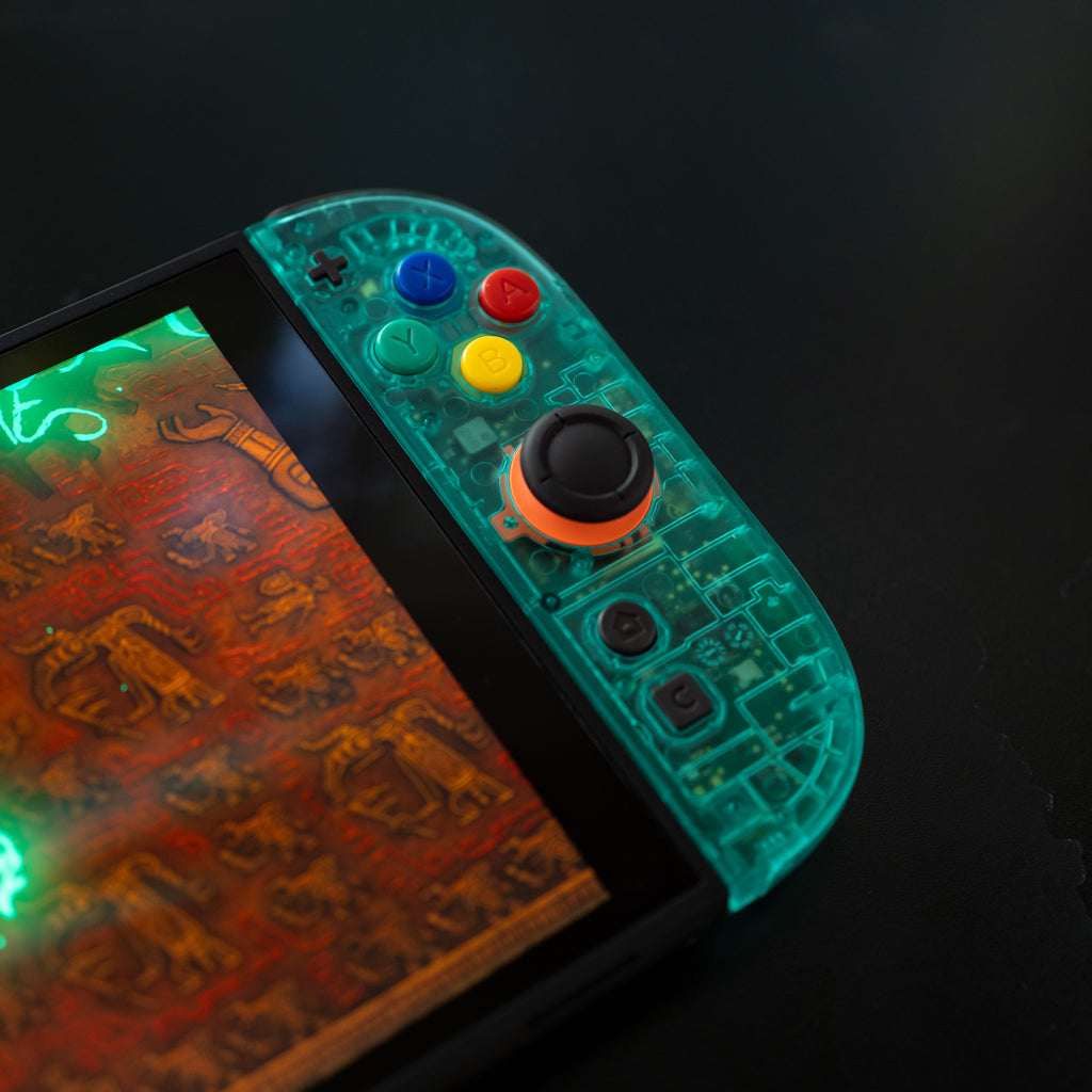 Translucent teal Switch 2 Joy-Cons with SNES buttons