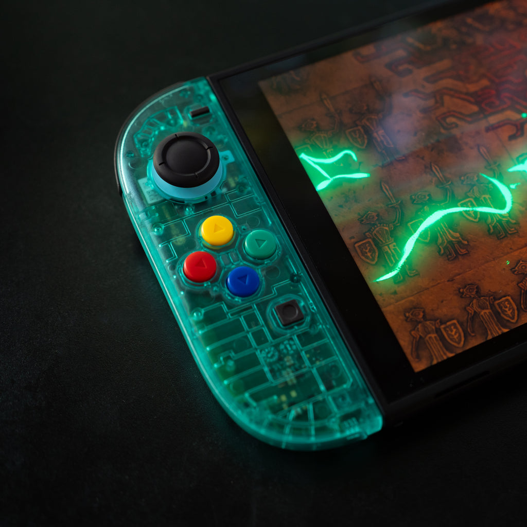 Translucent teal Switch 2 Joy-Cons with SNES buttons