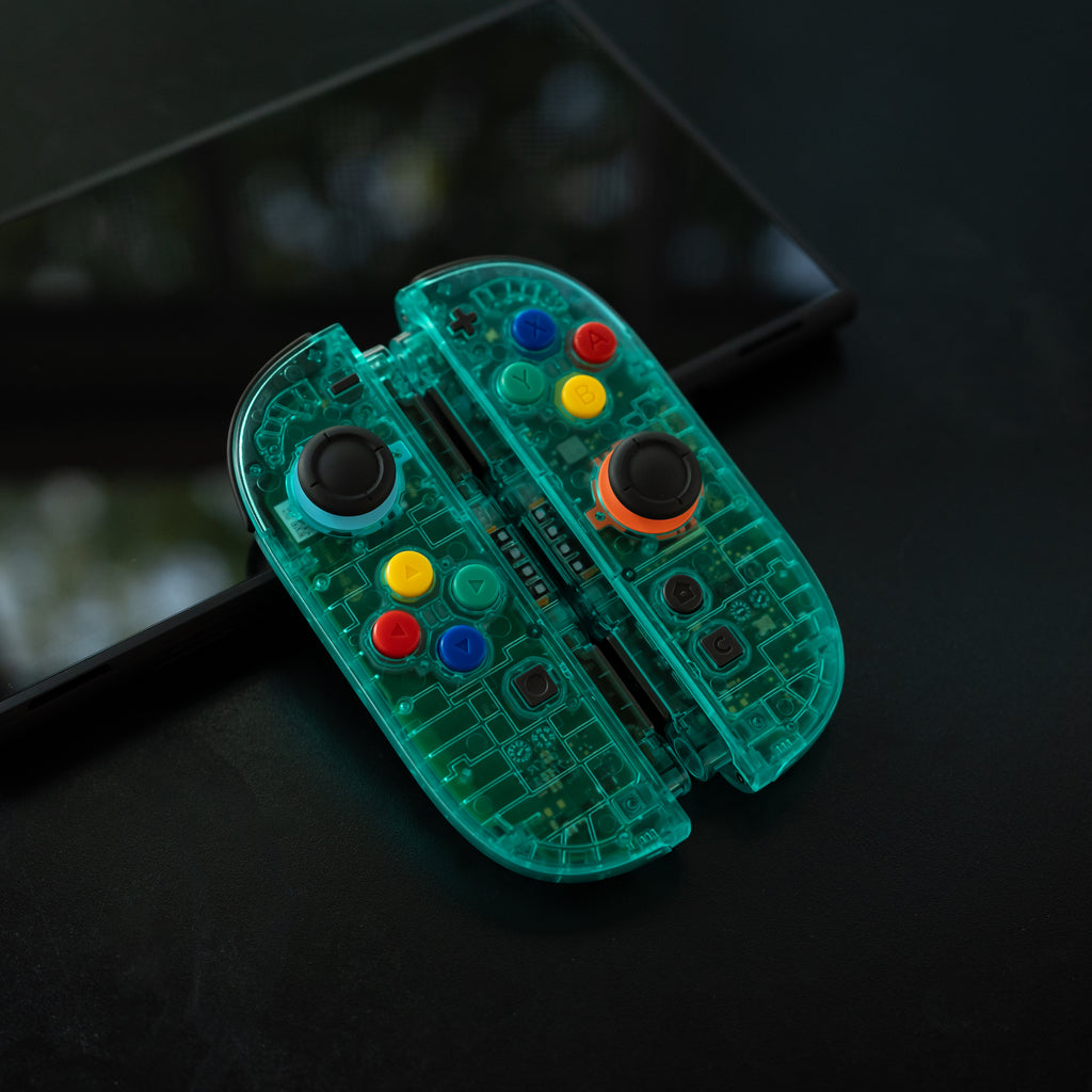 Translucent teal Switch 2 Joy-Cons with SNES buttons