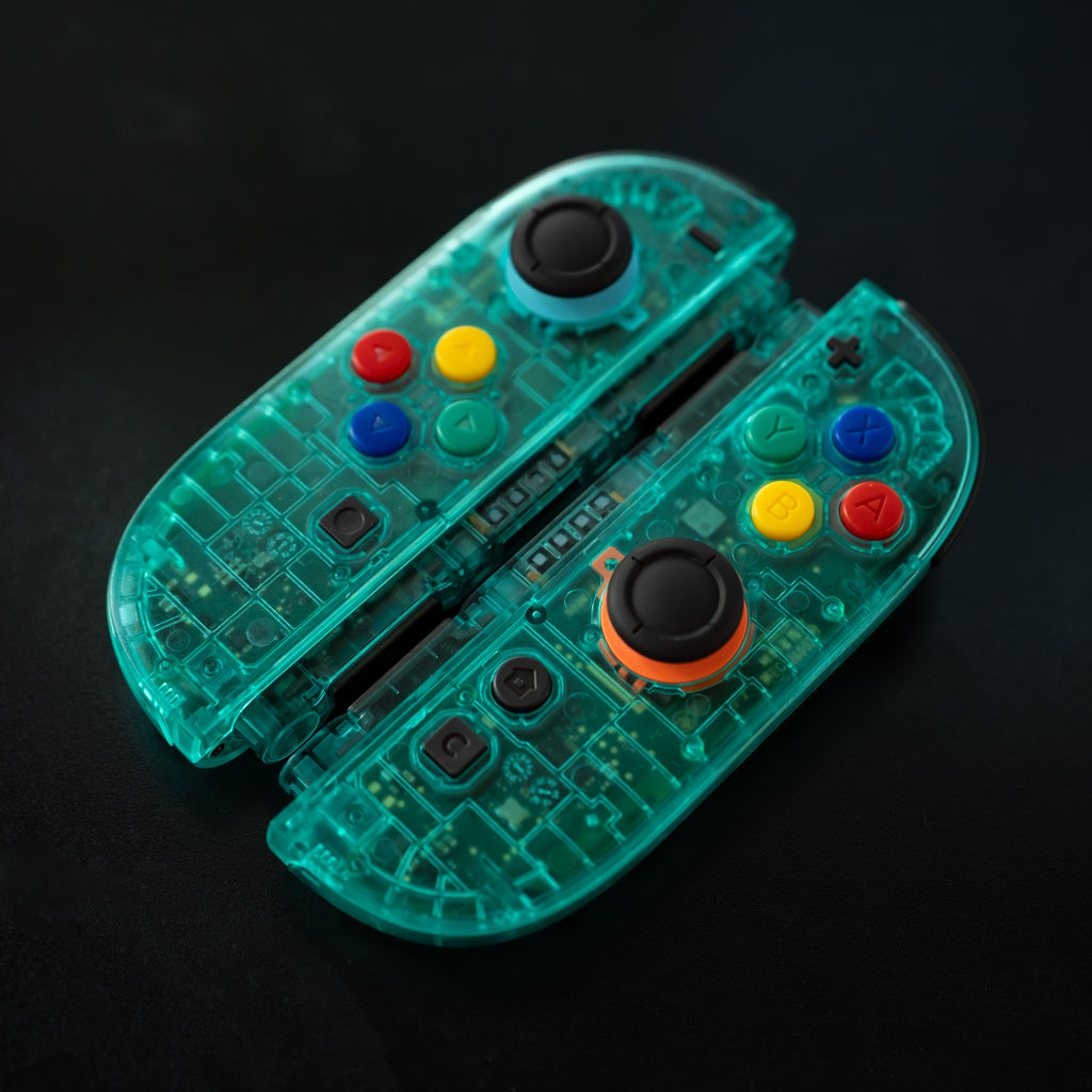 Clear teal Switch 2 Joy-Cons with SNES buttons