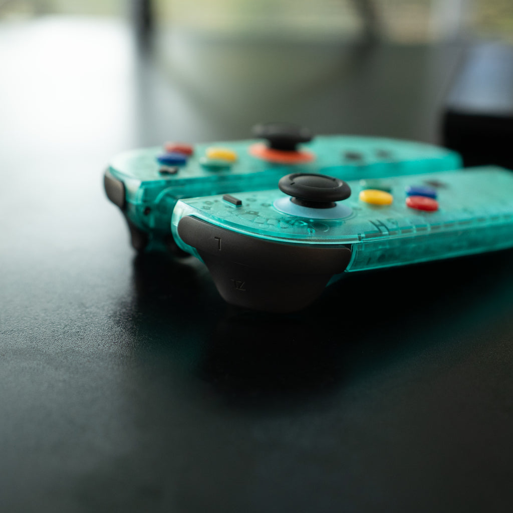 Clear teal Switch 2 Joy-Cons with SNES buttons