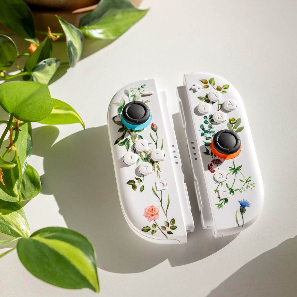 Custom Switch 2 Joy-Cons with a floral print and custom white buttons
