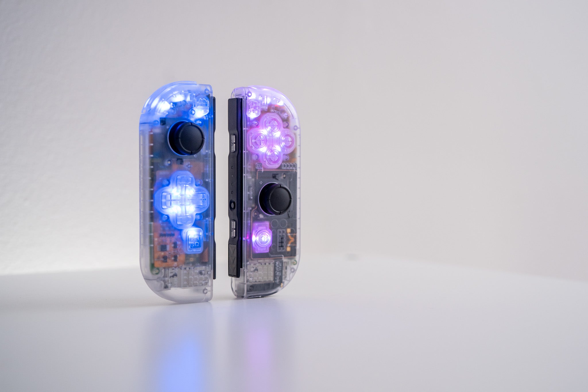 Custom gray joy-cons sale with translucent blue buttons