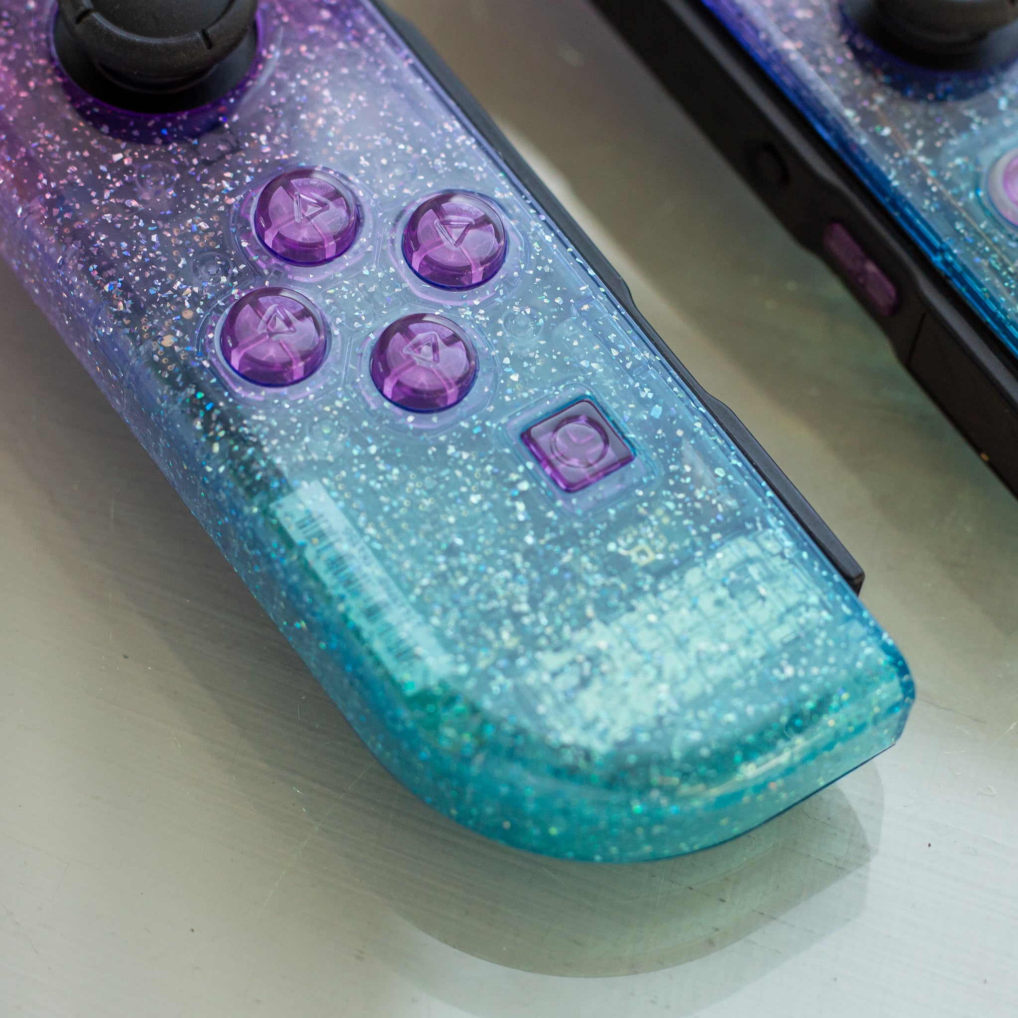 Cosmic Glitter Joy-Cons Clear Purple and Emerald Nintendo Switch 